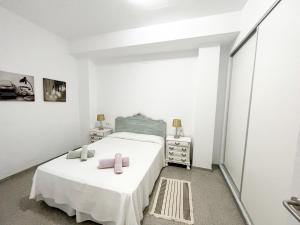 Posteľ alebo postele v izbe v ubytovaní Amplio apartamento en Av. Carlos Haya