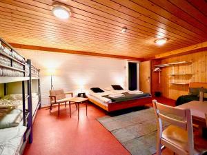 Family & Mountain Lodge C'est la Vie客房内的一张或多张床位