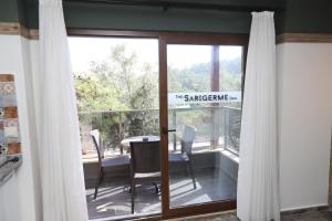 A balcony or terrace at THE SARIGERME INN