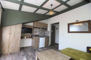 A kitchen or kitchenette at THE SARIGERME INN