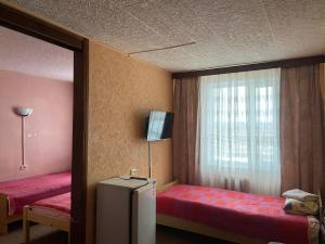 Postel nebo postele na pokoji v ubytování Riverside Motel Jelgava + 37 fotografií