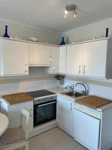 A kitchen or kitchenette at Residencial Vistamar