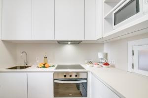 Kuchyňa alebo kuchynka v ubytovaní Ideal Property Mallorca - Carabela 44