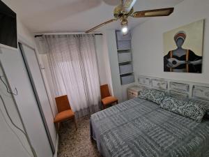 En eller flere senge i et værelse på DS San Miguel Centro de Córdoba