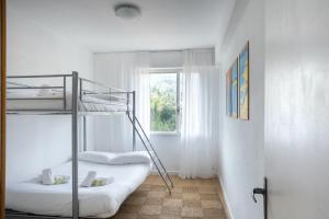 Katil dua tingkat atau katil-katil dua tingkat dalam bilik di El Mirador de Urdaibai