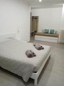 A bed or beds in a room at Dream Baveno