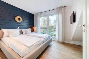 Katil atau katil-katil dalam bilik di Haus am Siel 02, zentral mit eigenem Steg