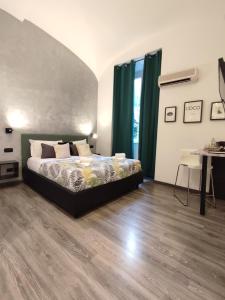 Posteľ alebo postele v izbe v ubytovaní Chroma Italy - Chroma Deka