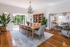 a dining room with a table and chairs at Kerrisdale Bowral in Bowral
