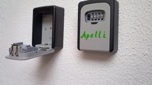 a pair of electrical outlets on a wall at Ciasa Apelli in Pozza di Fassa