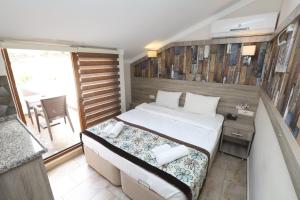 Postel nebo postele na pokoji v ubytování Street61 Apart Hotel