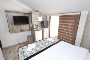 Kuchyň nebo kuchyňský kout v ubytování Street61 Apart Hotel