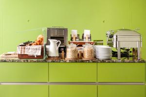 Cucina o angolo cottura di Tailormade Hotel IDEA Spreitenbach