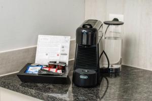 Set per la preparazione di tè e caffè presso Tailormade Hotel IDEA Spreitenbach