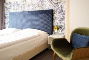 Letto o letti in una camera di Tailormade Hotel IDEA Spreitenbach