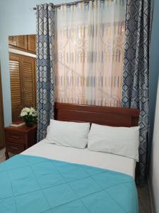 Postel nebo postele na pokoji v ubytování MH - Ground Floor Apart