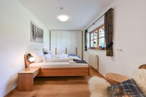 Ліжко або ліжка в номері Ferienwohnung Am Biberbach
