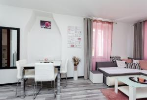a living room with a couch and a table at Apartment Mare in Vrsar