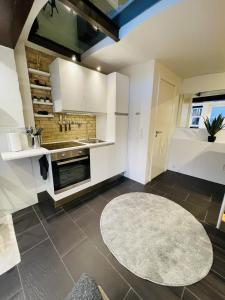 Köök või kööginurk majutusasutuses aday - Studio Apartment in the heart of Aalborg