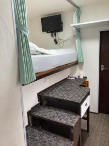 Postel nebo postele na pokoji v ubytování GreenHotel