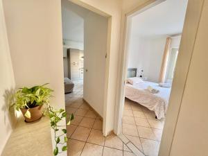 A bed or beds in a room at Borgo Antico Apartments