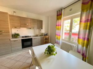 A kitchen or kitchenette at Borgo Antico Apartments