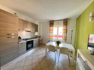A kitchen or kitchenette at Borgo Antico Apartments