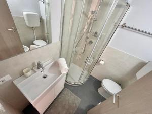 A bathroom at Borgo Antico Apartments