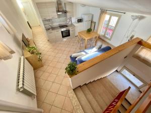A kitchen or kitchenette at Borgo Antico Apartments