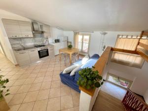 A kitchen or kitchenette at Borgo Antico Apartments