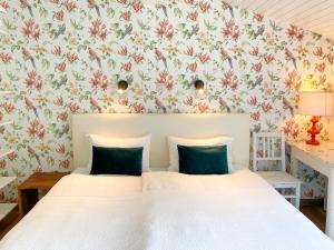 Ein Bett oder Betten in einem Zimmer der Unterkunft B&B De Paenhoeve