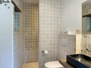 Ein Badezimmer in der Unterkunft B&B De Paenhoeve