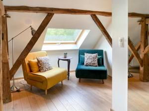 Ein Sitzbereich in der Unterkunft B&B De Paenhoeve