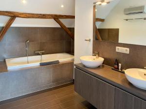 Ein Badezimmer in der Unterkunft B&B De Paenhoeve