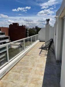 Un balcón o terraza en Departamento Moderno en General Paz