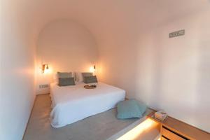 Posteľ alebo postele v izbe v ubytovaní Naillac Elite Suites