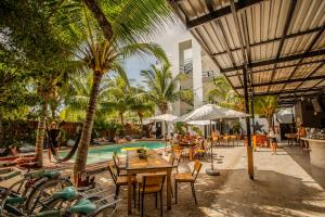 Restaurace v ubytování Che Holbox Hostel & Bar Adults Only