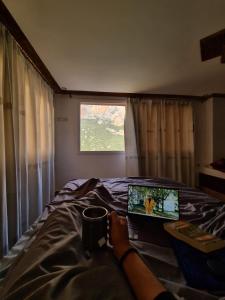 سرير أو أسرّة في غرفة في Complexe rueda