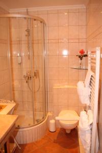 Koupelna v ubytování Romantik im Hotel Villa Röhl