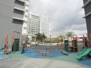 a playground with a slide and a play structure at Homestay TTDI ADINA 710 Shah Alam,Sek 13,MSU,3Bedroooms in Shah Alam