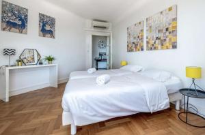Posteľ alebo postele v izbe v ubytovaní C082-Croisette - 2 Chambres - Vue Epoustouflante