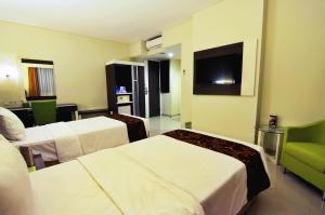Lova arba lovos apgyvendinimo įstaigoje Pose In Hotel Solo