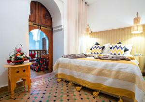 Postel nebo postele na pokoji v ubytování Riad La Croix Berbere Deluxe