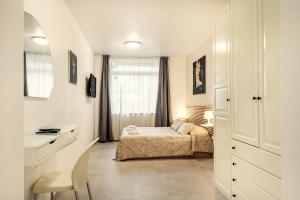 Posteľ alebo postele v izbe v ubytovaní Vincanto Rooms Old Town