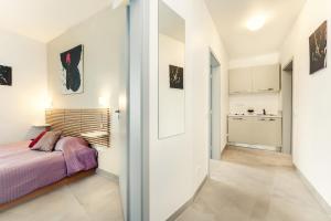 Posteľ alebo postele v izbe v ubytovaní Vincanto Rooms Old Town