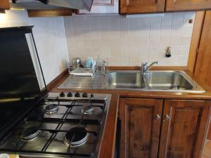 Kuchyň nebo kuchyňský kout v ubytování casa Margherita