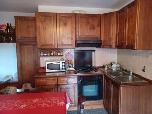 Kuchyň nebo kuchyňský kout v ubytování casa Margherita