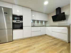 A kitchen or kitchenette at Mk77 - Gran Via