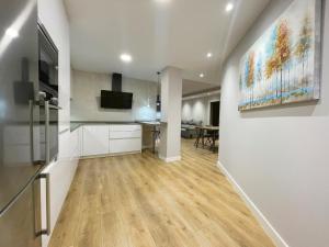 A kitchen or kitchenette at Mk77 - Gran Via