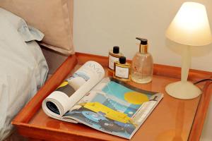 A bed or beds in a room at ELEGANT APARTMENT IN THE HEART OF ROME-NAVONA AREA